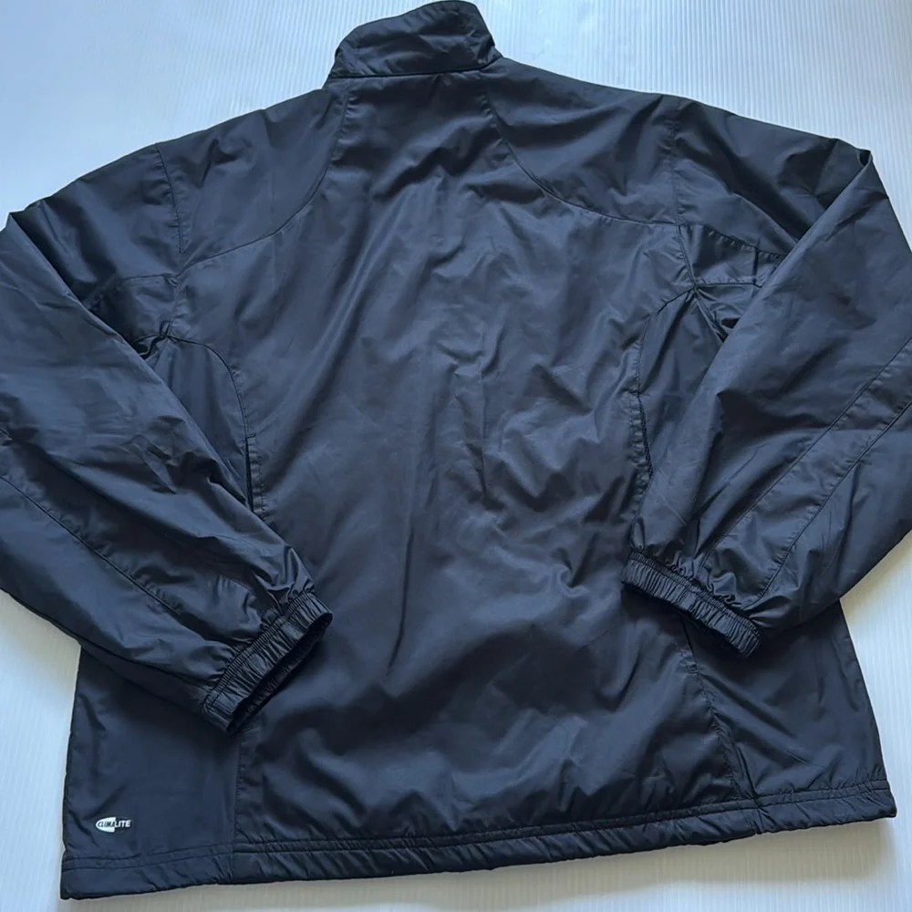 Vintage Adidas black, orange & white windbreaker jacket.  Men’s size small